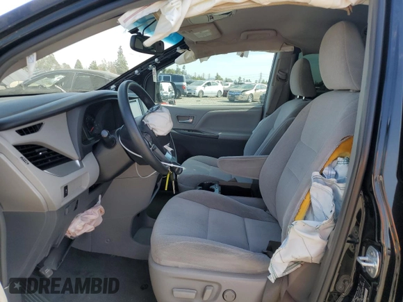 2015 Toyota Sienna LE AAS with VIN 5TDKK3DC8FS610940, listed as a Copart auction lot 47390285 with 128,893 mi miles and Salvage Title. Bid and sale history available at carsss.com. Image 7.
