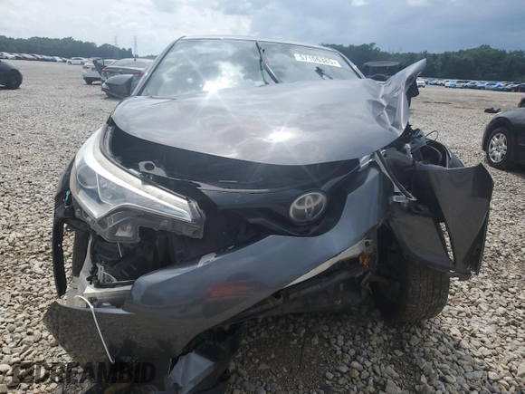 2018 Toyota C-HR XLE z VIN NMTKHMBX7JR004515, wystawiony jako Copart lot #57106385 z przebiegiem Nie podano mil oraz Szkoda całkowita • Salvage title. Historia ofert i sprzedaży dostępna na DreamBid. Obrazek 5.