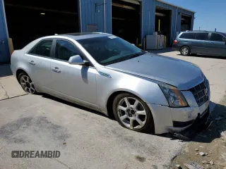 2009 Cadillac CTS AWD with VIN 1G6DG577690170912, listed as a Copart auction lot 56020815 with 142,932 mi miles and Clean Title. Bid and sale history available at DreamBid. Image 4.