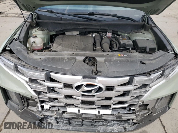 2022 Hyundai Santa Cruz SEL Premium z VIN 5NTJDDAF5NH016841, wystawiony jako Copart lot #58422695 z przebiegiem 27 287 mil mil oraz Szkoda całkowita • Salvage title. Historia ofert i sprzedaży dostępna na DreamBid. Obrazek 11.