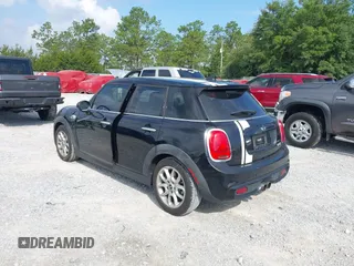 2016 MINI Hardtop 4 Door S z VIN WMWXU3C53G2D30807, wystawiony jako IAAI lot #42545577 z przebiegiem 86 952 mil mil oraz . Historia ofert i sprzedaży dostępna na DreamBid. Obrazek 3.