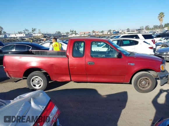2001 Ford F-150 XL with VIN 1FTZX172X1NB47317, listed as a IAAI auction lot 41676446 with Not provided miles and . Bid and sale history available at DreamBid. Image 14.