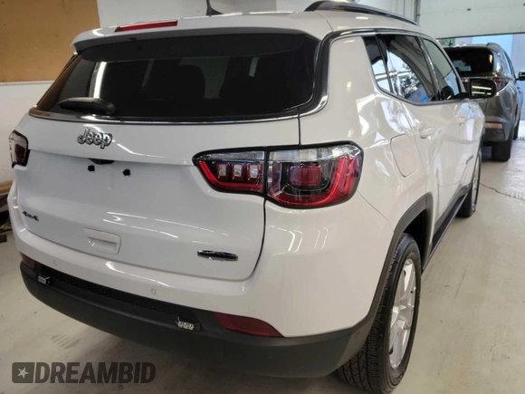 2022 Jeep Compass Latitude with VIN 3C4NJDBB1NT205930, listed as a IAAI auction lot 42801149 with 11,098 mi miles and . Bid and sale history available at DreamBid. Image 7.