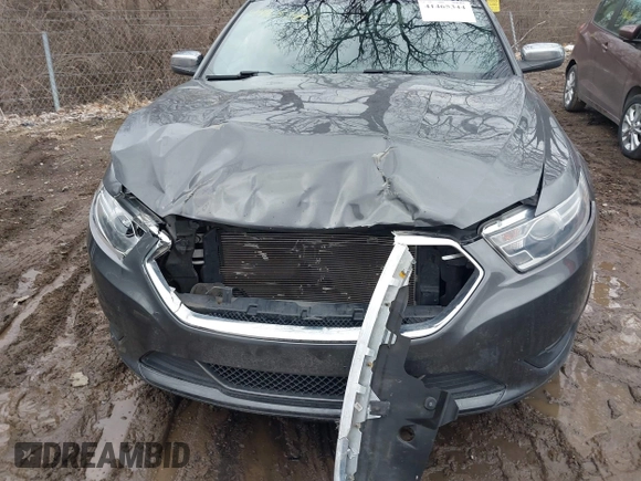 2015 Ford Taurus Limited with VIN 1FAHP2J88FG153326, listed as a IAAI auction lot 41465344 with 98,727 mi miles. Bid and sale history available at carsss.com. Image 6.