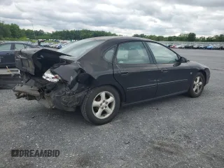 2001 Ford Taurus SEL with VIN 1FAFP56S01A258399, listed as a Copart auction lot 58963115 with 162,989 mi miles and Salvage title. Bid and sale history available at DreamBid. Image 3.