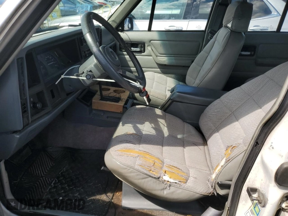 1994 Jeep Cherokee Sport with VIN 1J4FT68S8RL170171, listed as a Copart auction lot 70642694 with 240,165 mi miles and Salvage Title. Bid and sale history available at carsss.com. Image 7.