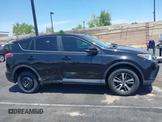 2018 Toyota RAV4 XLE z VIN 2T3WFREV1JW450514, wystawiony jako IAAI lot #42291018 z przebiegiem 89 370 mil mil oraz . Historia ofert i sprzedaży dostępna na DreamBid. Obrazek 14.