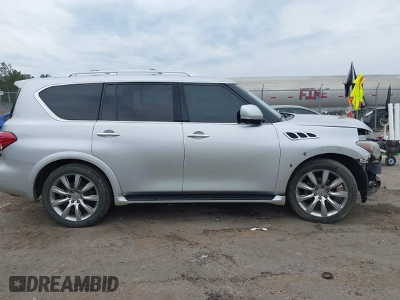 2012 Infiniti QX56 8-passenger with VIN JN8AZ2NC5C9317396, listed as a IAAI auction lot 41879874 with 233,064 mi miles. Bid and sale history available at carsss.com. Image 14.