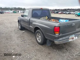 2000 Mazda B-Series Truck SX with VIN 4F4YR12C9YTM23599, listed as a IAAI auction lot 41393276 with 232,789 mi miles and . Bid and sale history available at DreamBid. Image 3.