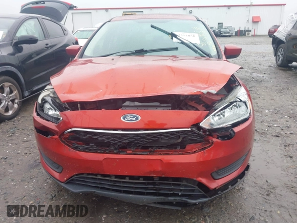 2018 Ford Focus SE with VIN 1FADP3F25JL265039, listed as a IAAI auction lot 42352050 with 140,127 mi miles and . Bid and sale history available at DreamBid. Image 12.