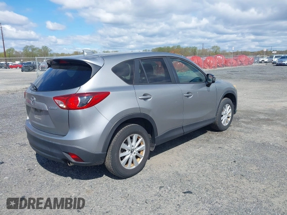 2013 Mazda CX-5 Touring with VIN JM3KE4CE5D0125470, listed as a IAAI auction lot 42051475 with 277,077 mi miles. Bid and sale history available at carsss.com. Image 4.