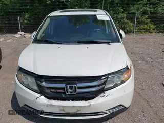 2014 Honda Odyssey EX-L with VIN 5FNRL5H63EB131596, listed as a IAAI auction lot 42402427 with 106,156 mi miles and . Bid and sale history available at DreamBid. Image 12.