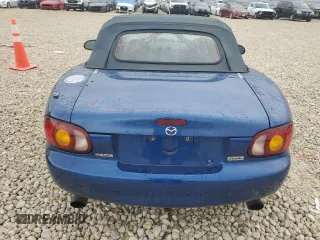 1999 Mazda MX-5 Miata with VIN JM1NB3532X0134801, listed as a Copart auction lot 83838374 with 97,015 mi miles and Salvage title. Bid and sale history available at DreamBid. Image 6.