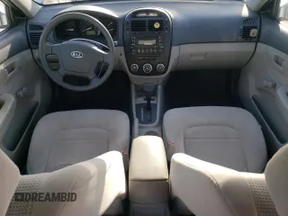 2009 Kia Spectra LX with VIN KNAFE221895659552, listed as a Copart auction lot 82555924 with 114,704 mi miles and Salvage Title. Bid and sale history available at carsss.com. Image 8.