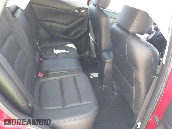 2015 Mazda CX-5 Grand Touring with VIN JM3KE4DY5F0469439, listed as a IAAI auction lot 42053851 with 70,676 mi miles. Bid and sale history available at carsss.com. Image 8.