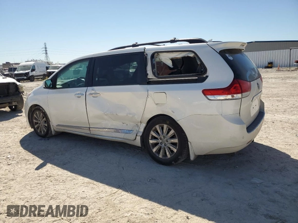 2014 Toyota Sienna XLE with VIN 5TDYK3DCXES470334, listed as a Copart auction lot 49579925 with 146,837 mi miles and Salvage Title. Bid and sale history available at DreamBid. Image 2.