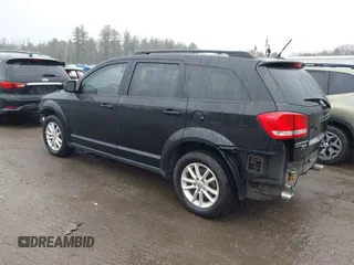 2015 Dodge Journey SXT with VIN 3C4PDDBG5FT639992, listed as a IAAI auction lot 41958496 with 132,410 mi miles and . Bid and sale history available at DreamBid. Image 3.