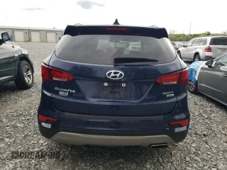 2017 Hyundai Santa Fe 2.4L z VIN 5XYZUDLB5HG483135, wystawiony jako Copart lot #55426735 z przebiegiem 93 470 mil mil oraz Szkoda całkowita • Salvage title. Historia ofert i sprzedaży dostępna na DreamBid. Obrazek 6.
