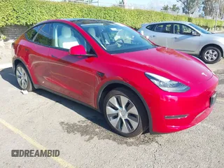 2020 Tesla Model Y Long Range with VIN 5YJYGDEE8LF057014, listed as a IAAI auction lot 41988113 with 18,246 mi miles and . Bid and sale history available at DreamBid. Image 1.