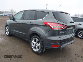 2015 Ford Escape SE with VIN 1FMCU9G96FUB90684, listed as a IAAI auction lot 41832982 with 127,900 mi miles. Bid and sale history available at carsss.com. Image 3.