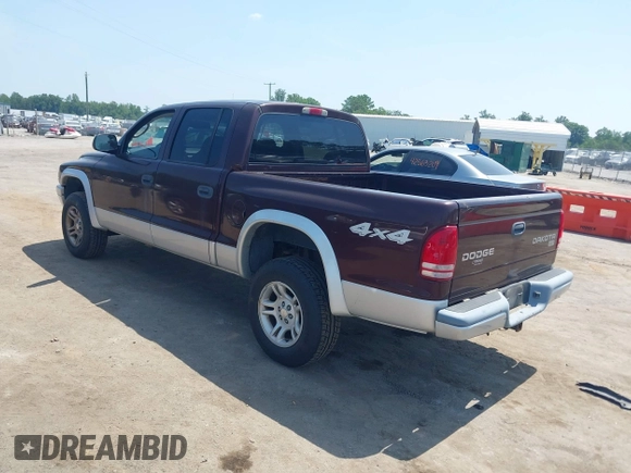 2004 Dodge Dakota SLT with VIN 1D7HG48N24S556431, listed as a IAAI auction lot 42591078 with 213,777 mi miles and . Bid and sale history available at DreamBid. Image 3.