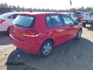 2012 Volkswagen Golf z VIN WVWDB7AJ0CW125030, wystawiony jako IAAI lot #41990949 z przebiegiem 173 197 mil mil oraz . Historia ofert i sprzedaży dostępna na DreamBid. Obrazek 4.