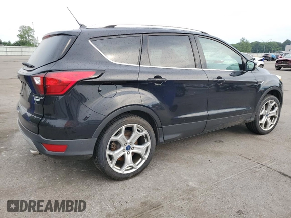 2019 Ford Escape Titanium with VIN 1FMCU0J95KUB14713, listed as a Copart auction lot 55887895 with 85,414 mi miles and Salvage title. Bid and sale history available at DreamBid. Image 3.