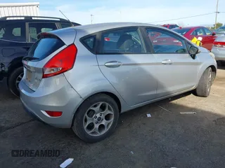 2011 Ford Fiesta SES with VIN 3FADP4FJ1BM149138, listed as a IAAI auction lot 41612288 with 131,798 mi miles. Bid and sale history available at carsss.com. Image 4.