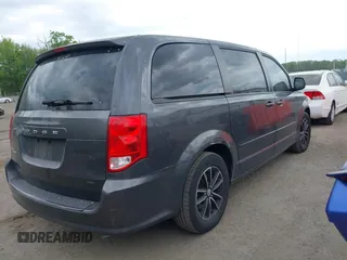 2015 Dodge Grand Caravan American Value with VIN 2C4RDGBG2FR542844, listed as a IAAI auction lot 42109983 with 129,718 mi miles and . Bid and sale history available at DreamBid. Image 4.