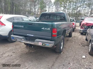 1998 Dodge Ram 1500 with VIN 3B7HF13ZXWG137601, listed as a IAAI auction lot 41823656 with 204,635 mi miles. Bid and sale history available at carsss.com. Image 4.
