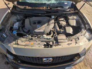 2023 Mazda CX-50 2.5 Turbo with VIN 7MMVABXY0PN152447, listed as a Copart auction lot 50781195 with 28,806 mi miles and Salvage Title. Bid and sale history available at carsss.com. Image 12.