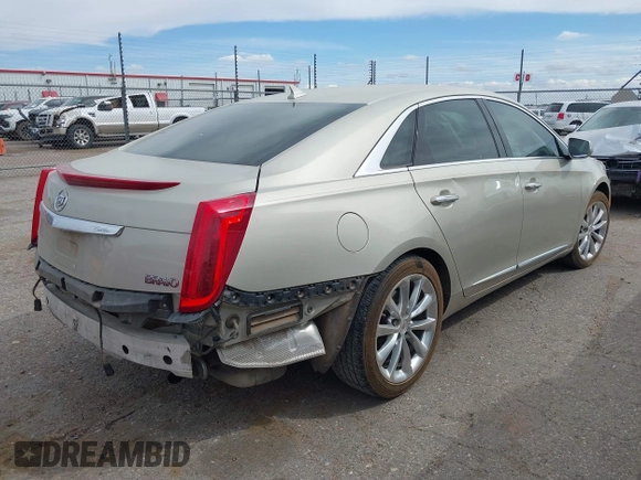 2013 Cadillac XTS Luxury with VIN 2G61P5S30D9132193, listed as a IAAI auction lot 41897709 with 140,780 mi miles and . Bid and sale history available at DreamBid. Image 4.