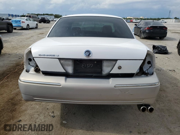 2006 Mercury Grand Marquis LS Premium z VIN 2MEHM75V16X616173, wystawiony jako Copart lot #56492355 z przebiegiem 83 854 mil mil oraz Szkody całkowita. Historia ofert i sprzedaży dostępna na DreamBid. Obrazek 6.