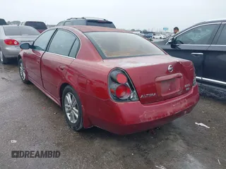 2006 Nissan Altima 2.5 with VIN 1N4AL11D96N401521, listed as a IAAI auction lot 41451401 with 233,591 mi miles. Bid and sale history available at carsss.com. Image 3.