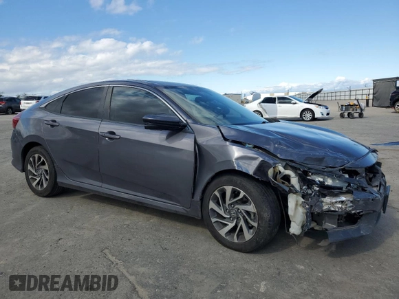 2018 Honda Civic EX с VIN 2HGFC2F71JH519669, выставлен на аукционе Copart как лот 47283725 с пробегом 130 590 миль миль и Списание • Salvage title. История ставок и продаж доступна на DreamBid. Изображение 4.