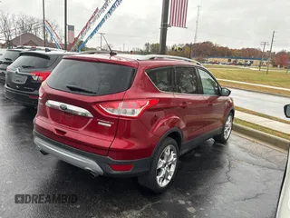 2014 Ford Escape Titanium with VIN 1FMCU0JX8EUC19300, listed as a Copart auction lot 79009664 with 111,705 mi miles and Clean Title. Bid and sale history available at carsss.com. Image 4.