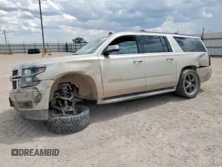 2015 Chevrolet Suburban LT with VIN 1GNSCJKC0FR153454, listed as a Copart auction lot 62672615 with 184,498 mi miles and Salvage title. Bid and sale history available at DreamBid. Image 1.