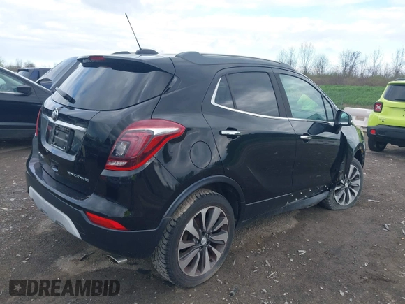 2017 Buick Encore Essence with VIN KL4CJCSB5HB112457, listed as a IAAI auction lot 42180602 with 125,238 mi miles and . Bid and sale history available at carsss.com. Image 4.