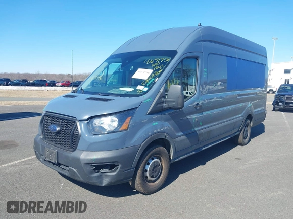 2021 Ford Transit Cargo with VIN 1FTBR3X84MKA54150, listed as a IAAI auction lot 41671756 with 96,556 mi miles and . Bid and sale history available at DreamBid. Image 2.