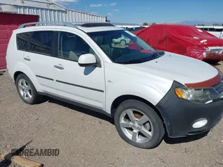 2007 Mitsubishi Outlander XLS z VIN JA4MT41X27Z020276, wystawiony jako IAAI lot #42348742 z przebiegiem 75 715 mil mil oraz . Historia ofert i sprzedaży dostępna na DreamBid. Obrazek 1.