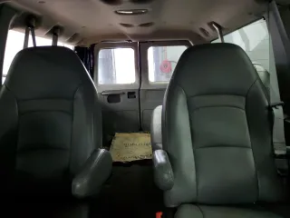 2008 Ford Econoline Passenger XL with VIN 1FMNE11L18DB43562, listed as a Copart auction lot 50723515 with 143,874 mi miles and Salvage Title. Bid and sale history available at carsss.com. Image 10.