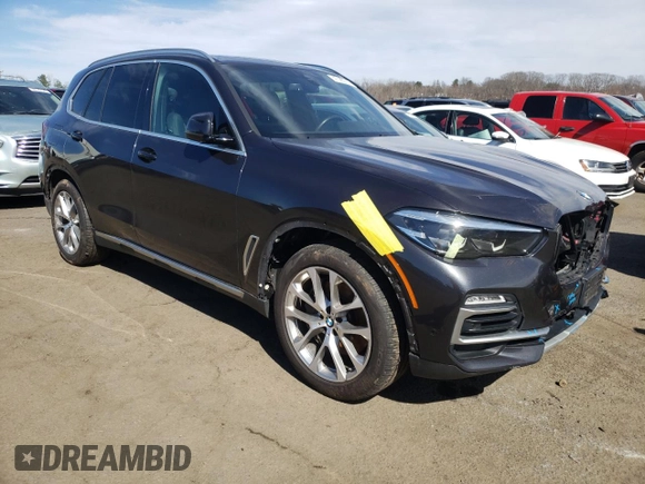 2021 BMW X5 xDrive45e with VIN 5UXTA6C01M9H62393, listed as a Copart auction lot 47083315 with 66,910 mi miles and Salvage title. Bid and sale history available at DreamBid. Image 4.