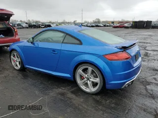 2017 Audi TTS z VIN TRUC1AFV6H1016086, wystawiony jako Copart lot #50649944 z przebiegiem 35 209 mil mil oraz . Historia ofert i sprzedaży dostępna na DreamBid. Obrazek 2.