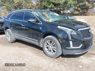 2020 Cadillac XT5 Premium Luxury AWD with VIN 1GYKNDRS3LZ107687, listed as a IAAI auction lot 41887306 with 54,959 mi miles and . Bid and sale history available at DreamBid. Image 1.