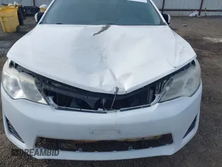 2013 Toyota Camry L with VIN 4T1BF1FK6DU269362, listed as a IAAI auction lot 42004165 with 184,876 mi miles. Bid and sale history available at carsss.com. Image 6.