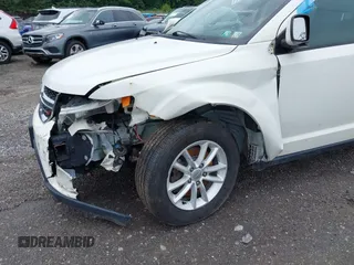 2017 Dodge Journey SXT with VIN 3C4PDDBG2HT702775, listed as a IAAI auction lot 42596303 with 130,639 mi miles and . Bid and sale history available at DreamBid. Image 6.