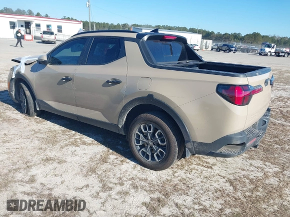 2023 Hyundai Santa Cruz SEL z VIN 5NTJC4AE9PH057499, wystawiony jako IAAI lot #41293004 z przebiegiem 60 851 mil mil oraz . Historia ofert i sprzedaży dostępna na DreamBid. Obrazek 3.