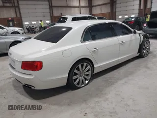 2015 Bentley Flying Spur V8 with VIN SCBET9ZA9F8049207, listed as a IAAI auction lot 41959074 with 85,839 mi miles and . Bid and sale history available at DreamBid. Image 4.