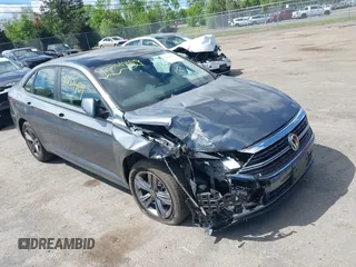 2023 Volkswagen Jetta SE with VIN 3VW7M7BU0PM052048, listed as a IAAI auction lot 42201469 with 10,071 mi miles and . Bid and sale history available at DreamBid. Image 1.
