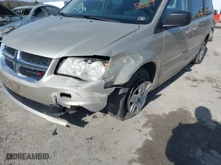 2012 Dodge Grand Caravan SE with VIN 2C4RDGBG3CR385529, listed as a IAAI auction lot 41506810 with 153,300 mi miles. Bid and sale history available at carsss.com. Image 6.